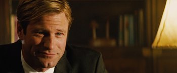 Movie still from “Thank You for Smoking” (2005), directed by Jason Reitman – A person wearing a suit and tie; Close Up shot, Over the shoulder angle