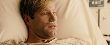 Movie still from “Thank You for Smoking” (2005), directed by Jason Reitman – A person laying in a hospital bed; Close Up shot, Overhead angle
