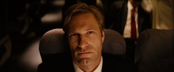 Movie still from “Thank You for Smoking” (2005), directed by Jason Reitman – A person wearing a suit and tie; Close Up shot, Low angle