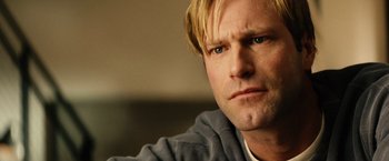 Movie still from “Thank You for Smoking” (2005), directed by Jason Reitman – A person wearing a hooded sweatshirt; Close Up shot, Low angle