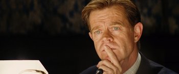 Movie still from “Thank You for Smoking” (2005), directed by Jason Reitman – A person with his hand to his face; Close Up shot, Low angle