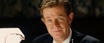 Movie still from “Thank You for Smoking” (2005), directed by Jason Reitman – A person wearing a suit and tie; Close Up shot, Low angle