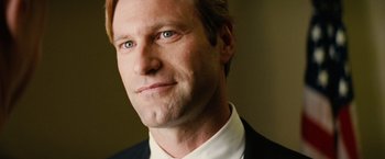 Movie still from “Thank You for Smoking” (2005), directed by Jason Reitman – A person wearing a suit and tie; Close Up shot, Over the shoulder angle