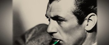 Movie still from “Thank You for Smoking” (2005), directed by Jason Reitman – A person holding a tooth brush in his mouth; Extreme Close Up shot, High angle