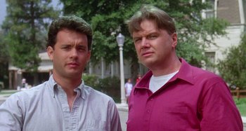 Movie still from “The 'Burbs” (1989), directed by Joe Dante – A couple of men standing next to each other; Close Up shot, Low angle