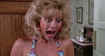 Movie still from “The 'Burbs” (1989), directed by Joe Dante – A person wearing a bathing suit; Close Up shot, Low angle