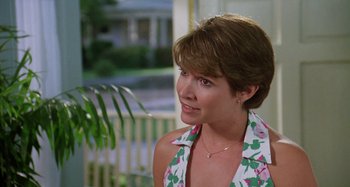 Movie still from “The 'Burbs” (1989), directed by Joe Dante – A person wearing a floral shirt; Close Up shot, Over the shoulder angle