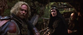 Movie still from “The 13th Warrior” (1999), directed by Michael Crichton – Two men in medieval garb standing next to each other; Close Up shot, Low angle