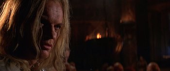 Movie still from “The 13th Warrior” (1999), directed by Michael Crichton – A man with blonde hair and a long beard; Close Up shot, Over the shoulder angle