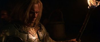 Movie still from “The 13th Warrior” (1999), directed by Michael Crichton – A person wearing a costume; Close Up shot, Over the shoulder angle