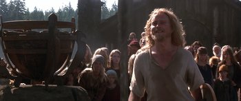 Movie still from “The 13th Warrior” (1999), directed by Michael Crichton – A group of people standing in a line; Medium shot, Over the shoulder angle