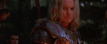 Movie still from “The 13th Warrior” (1999), directed by Michael Crichton – A person wearing a costume; Close Up shot, Low angle