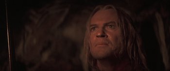 Movie still from “The 13th Warrior” (1999), directed by Michael Crichton – A person with long blonde hair; Close Up shot, Low angle