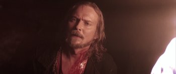 Movie still from “The 13th Warrior” (1999), directed by Michael Crichton – A person with long hair; Close Up shot, Over the shoulder angle