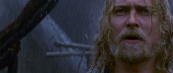 Movie still from “The 13th Warrior” (1999), directed by Michael Crichton – A person with long hair; Close Up shot, Low angle