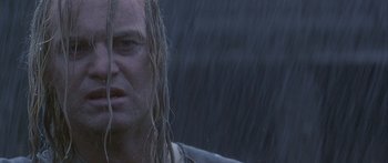 Movie still from “The 13th Warrior” (1999), directed by Michael Crichton – A person with long blonde hair; Close Up shot, Low angle