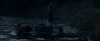 Movie still from “Out Stealing Horses” (2019), directed by Hans Petter Moland – A woman walking across a bridge over a river; Wide shot, High angle
