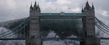 Movie still from “The 5th Wave” (2016), directed by J Blakeson – A large body of water with a bridge in the middle of it; Extreme Wide shot, High angle