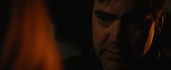 Movie still from “The 5th Wave” (2016), directed by J Blakeson – A man's face in the dark; Close Up shot, Over the shoulder angle