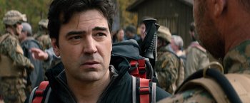 Movie still from “The 5th Wave” (2016), directed by J Blakeson – A person with a backpack; Close Up shot, Over the shoulder angle
