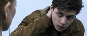 Movie still from “The 5th Wave” (2016), directed by J Blakeson – A person wearing a jacket; Close Up shot, Low angle