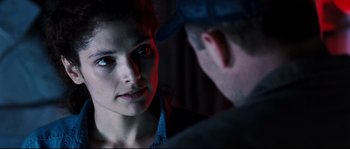 Movie still from “The Abyss” (1989), directed by James Cameron – A man and a woman looking at one another; Close Up shot, Over the shoulder angle