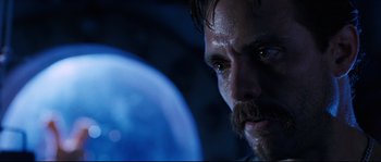 Movie still from “The Abyss” (1989), directed by James Cameron – A person with a beard; Close Up shot, Low angle