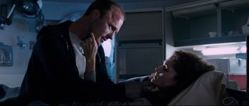 Movie still from “The Abyss” (1989), directed by James Cameron – A man and a woman are looking at one another; Close Up shot, Low angle