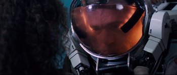 Movie still from “The Abyss” (1989), directed by James Cameron – View of a person's face in a pot; Close Up shot, Overhead angle