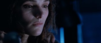 Movie still from “The Abyss” (1989), directed by James Cameron – A woman's face as she stares into the distance; Close Up shot, Over the shoulder angle