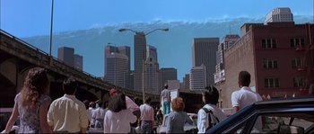 Movie still from “The Abyss” (1989), directed by James Cameron – A group of people standing on top of a bridge; Extreme Wide shot, Low angle