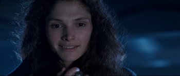 Movie still from “The Abyss” (1989), directed by James Cameron – A person holding a cell phone; Close Up shot, Low angle