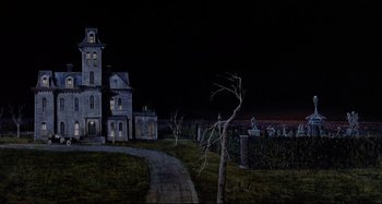 Movie still from “The Addams Family” (1991), directed by Barry Sonnenfeld – A painting of an old house in the dark; Extreme Wide shot, Low angle