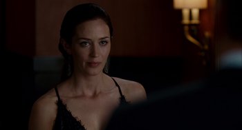 Movie still from “The Adjustment Bureau” (2011), directed by George Nolfi – A woman sitting in a chair in front of a mirror; Close Up shot, Over the shoulder angle