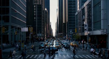 Movie still from “The Adjustment Bureau” (2011), directed by George Nolfi – A busy city street filled with lots of traffic; Extreme Wide shot, High angle
