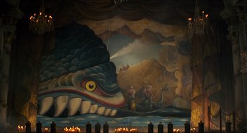 Movie still from “The Adventures of Baron Munchausen” (1988), directed by Terry Gilliam – A painting of a dragon on the wall of a theater; Extreme Wide shot, High angle