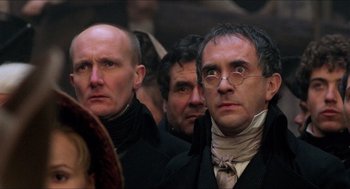 Movie still from “The Adventures of Baron Munchausen” (1988), directed by Terry Gilliam – A group of men standing next to each other; Close Up shot, Low angle