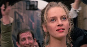 Movie still from “The Adventures of Baron Munchausen” (1988), directed by Terry Gilliam – A person with long blonde hair; Close Up shot, Low angle