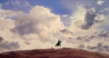 Movie still from “The Adventures of Baron Munchausen” (1988), directed by Terry Gilliam – A painting of a person on a horse in the desert; Extreme Wide shot, Low angle