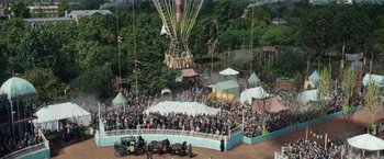 Movie still from “The Aeronauts” (2019), directed by Tom Harper – A crowd of people gathered in a field; Extreme Wide shot, High angle