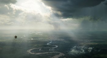 Movie still from “The Aeronauts” (2019), directed by Tom Harper – A view from a plane looking down at a river and a city; Extreme Wide shot, Overhead angle