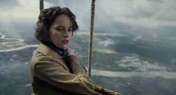 Movie still from “The Aeronauts” (2019), directed by Tom Harper – A woman is sitting in a hot air balloon; Close Up shot, High angle
