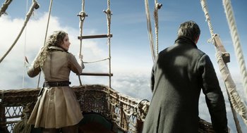 Movie still from “The Aeronauts” (2019), directed by Tom Harper – Two people are on a boat in the sky; Wide shot, Low angle