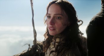 Movie still from “The Aeronauts” (2019), directed by Tom Harper – A person with long brown hair; Close Up shot, Low angle