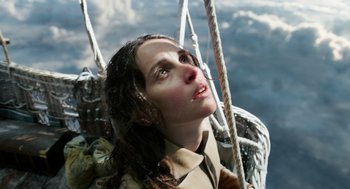 Movie still from “The Aeronauts” (2019), directed by Tom Harper – A woman with long brown hair is looking up; Close Up shot, Overhead angle