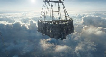 Movie still from “The Aeronauts” (2019), directed by Tom Harper – A hot air balloon flying through the sky; Extreme Wide shot, Low angle