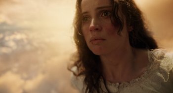 Movie still from “The Aeronauts” (2019), directed by Tom Harper – A person looking at the camera; Close Up shot, Low angle