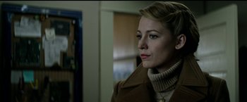 Movie still from “The Age of Adaline” (2015), directed by Lee Toland Krieger – A person wearing a coat; Close Up shot, Over the shoulder angle