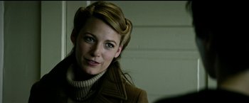 Movie still from “The Age of Adaline” (2015), directed by Lee Toland Krieger – A woman in a brown coat and a white sweater; Close Up shot, Over the shoulder angle