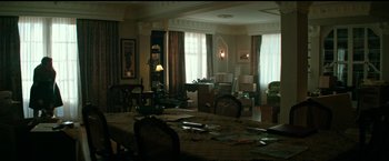 Movie still from “The Age of Adaline” (2015), directed by Lee Toland Krieger – A dining room with a lot of boxes on the table; Wide shot, High angle